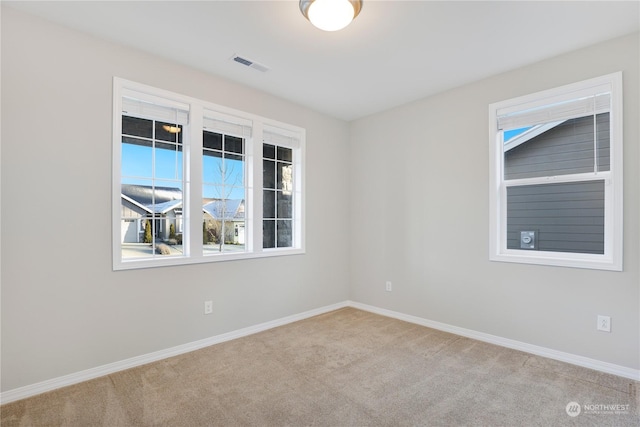 view of carpeted spare room