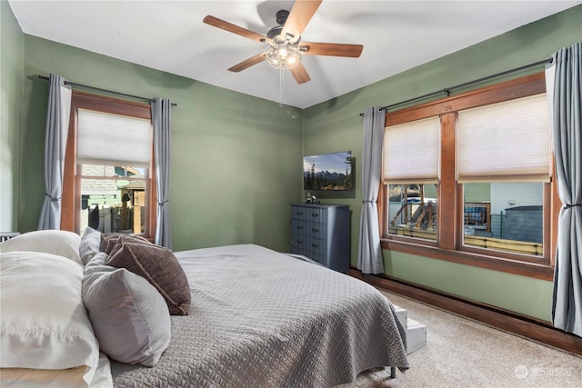 bedroom featuring ceiling fan and carpet flooring