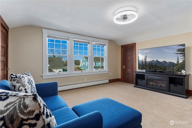 carpeted living room with lofted ceiling and a baseboard heating unit