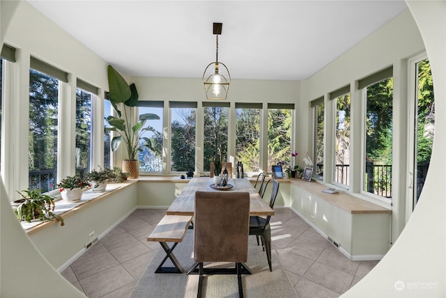 sunroom / solarium with plenty of natural light