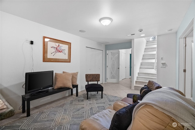 living room with light tile patterned floors