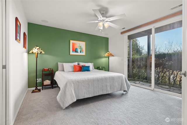 bedroom featuring ceiling fan, carpet flooring, and access to outside