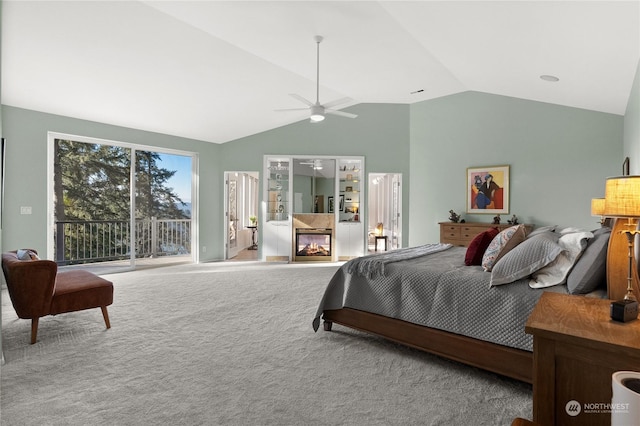 carpeted bedroom featuring lofted ceiling, access to outside, and ceiling fan