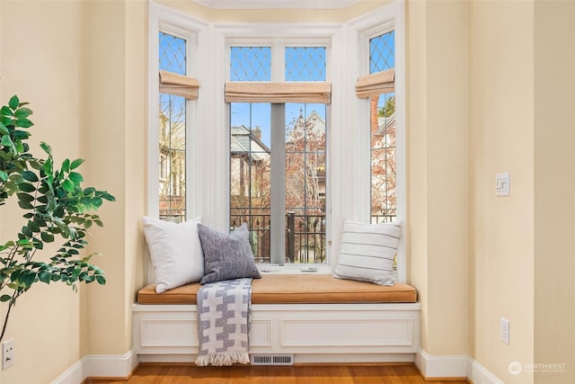 sitting room featuring light hardwood / wood-style floors