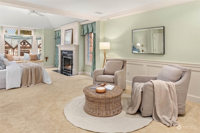 carpeted bedroom featuring crown molding, a fireplace, and vaulted ceiling