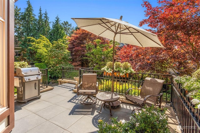 view of patio with a grill