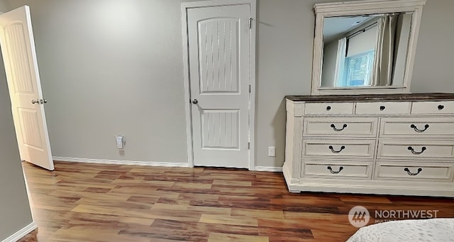 unfurnished bedroom featuring light wood-type flooring