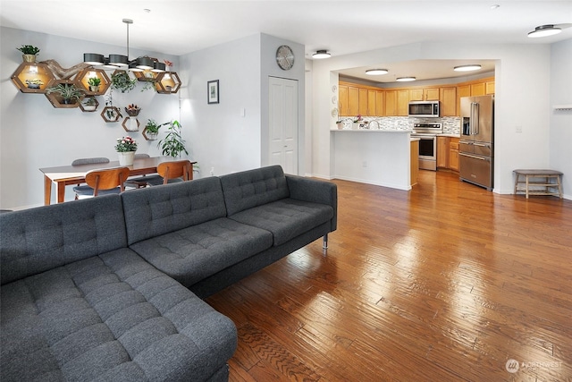 living room with light hardwood / wood-style flooring