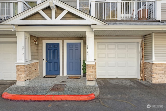 property entrance with a garage