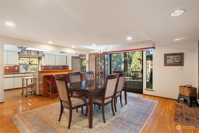 dining room with light hardwood / wood-style flooring