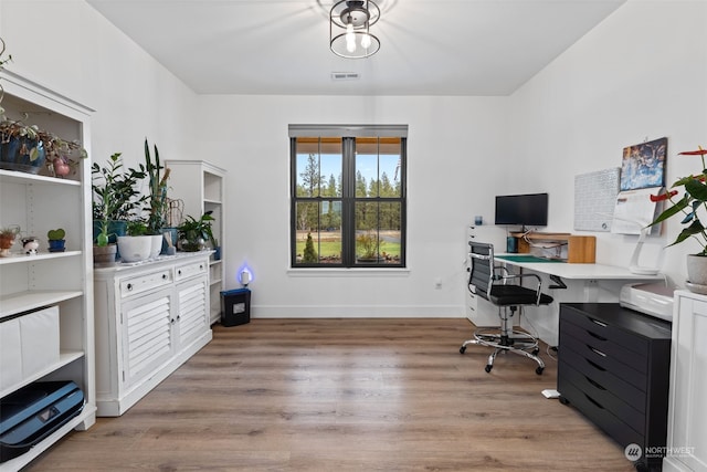 office space featuring light wood-type flooring