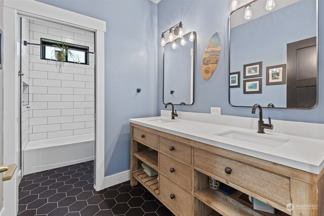 bathroom with tile patterned floors and vanity