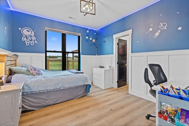 bedroom with light hardwood / wood-style flooring