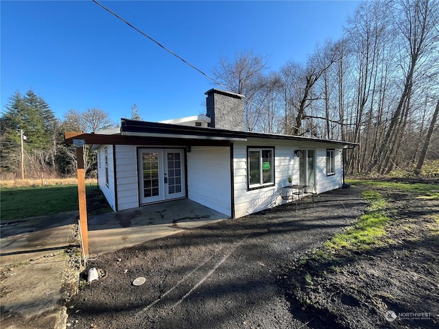 back of property with french doors