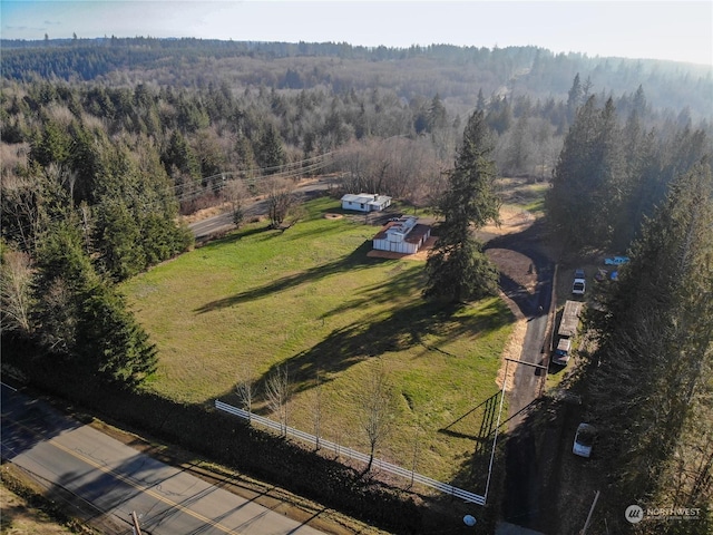 birds eye view of property featuring a rural view