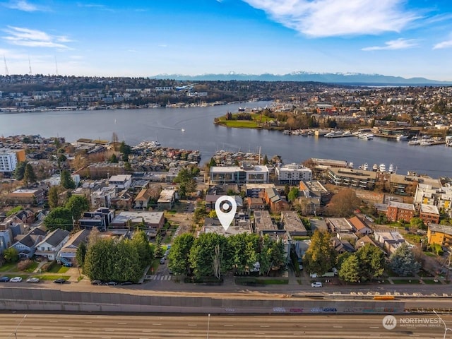 birds eye view of property featuring a water view