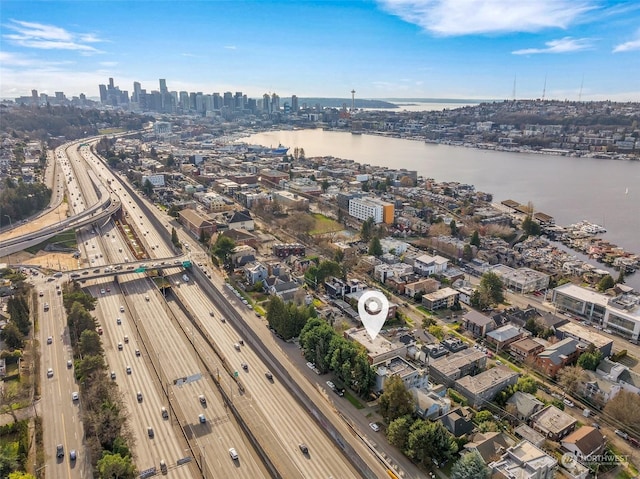 aerial view with a water view and a view of city