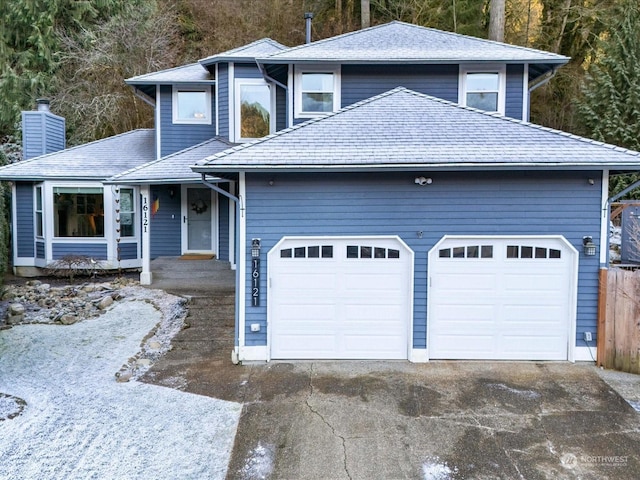 view of front of property featuring a garage