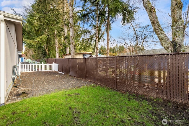 view of yard featuring a fenced backyard