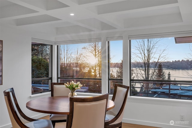 sunroom with coffered ceiling and beam ceiling