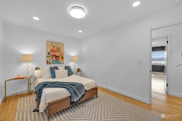 bedroom featuring wood-type flooring