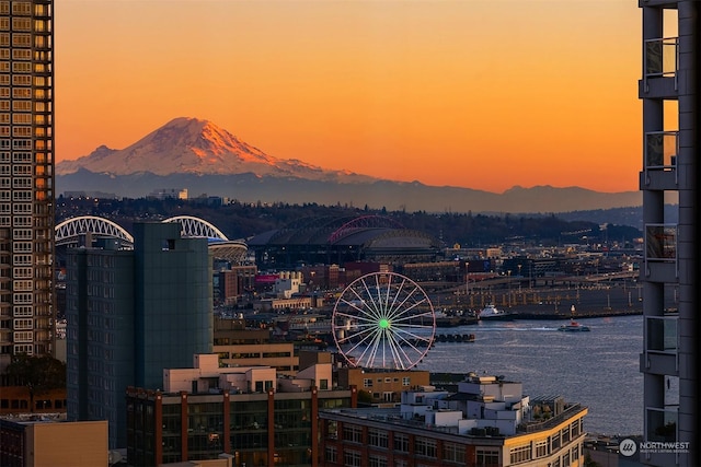 city view featuring a water and mountain view