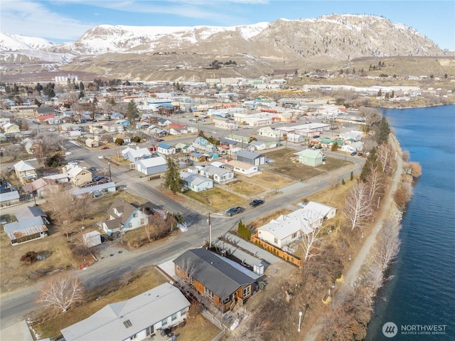 bird's eye view featuring a water and mountain view