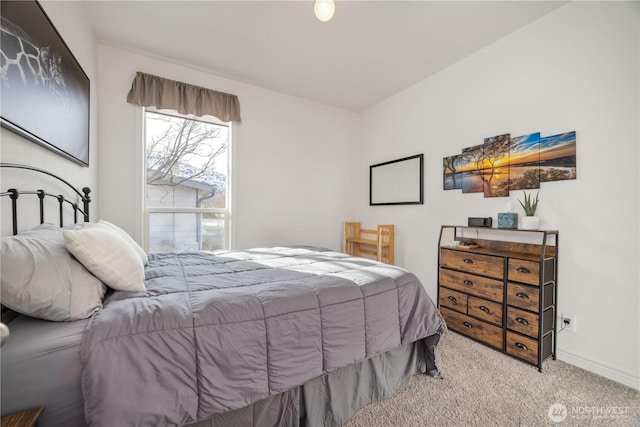 bedroom with light carpet