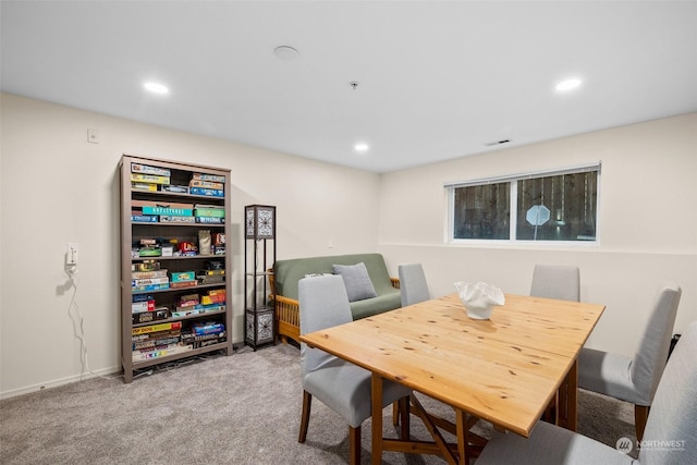 view of carpeted dining room