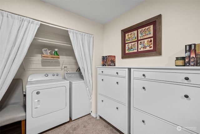 laundry room with light carpet and washing machine and clothes dryer