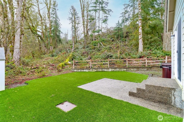 view of yard featuring fence