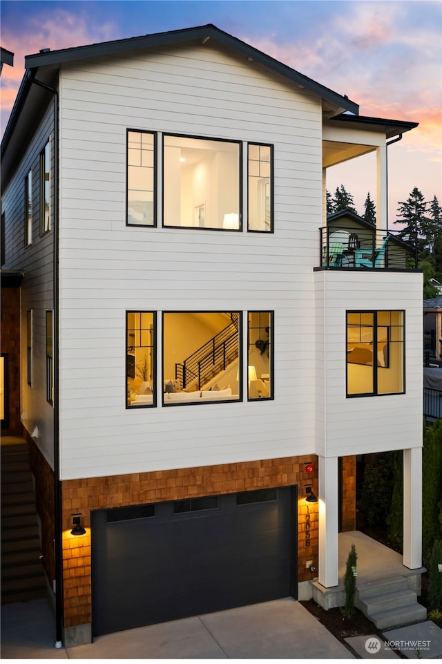 modern home featuring a garage