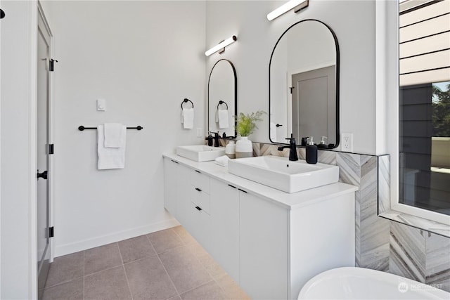 bathroom with vanity and tile patterned flooring