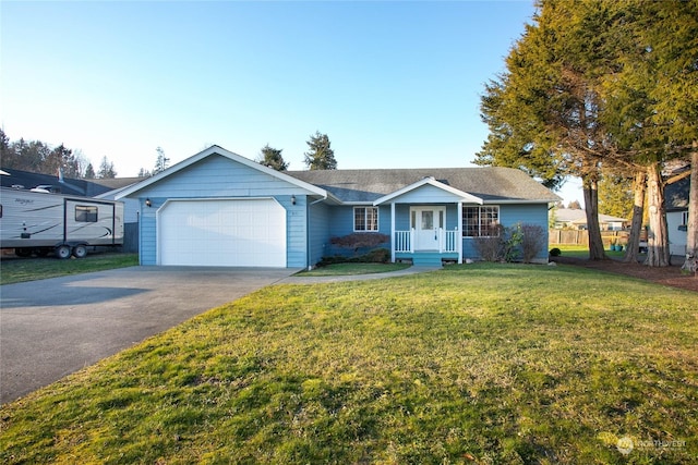 single story home with a garage and a front lawn