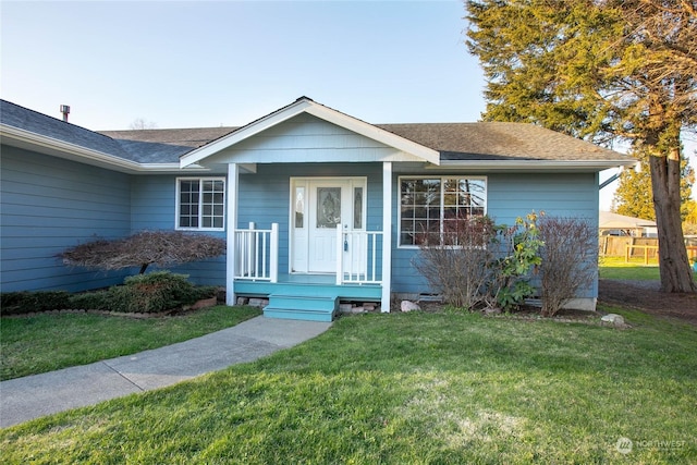 ranch-style house with a front yard