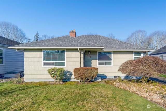 view of front of home with a front lawn