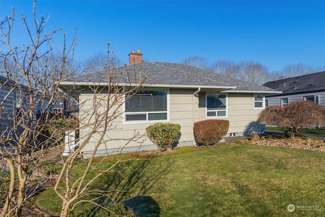 exterior space with a front lawn