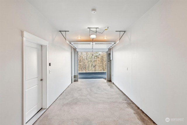 hallway featuring concrete flooring