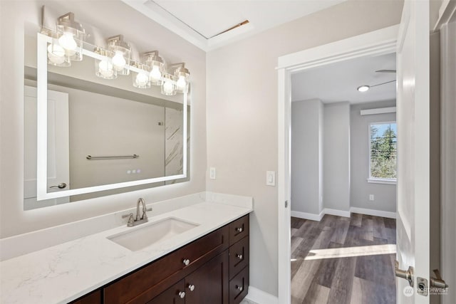 bathroom featuring vanity and hardwood / wood-style floors