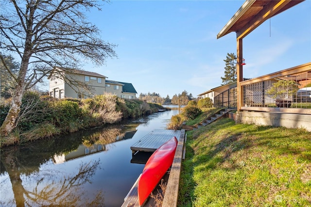 dock area with a water view