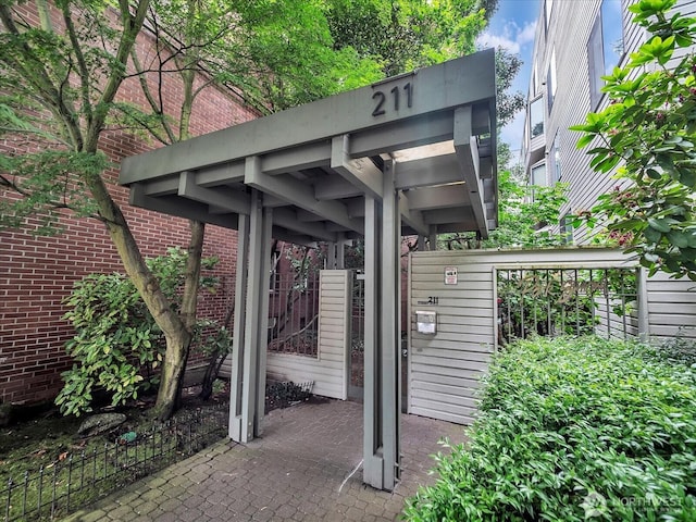 211 Summit Ave E Unit N308, Seattle, WA 98102 - view of parking / parking lot featuring a gate