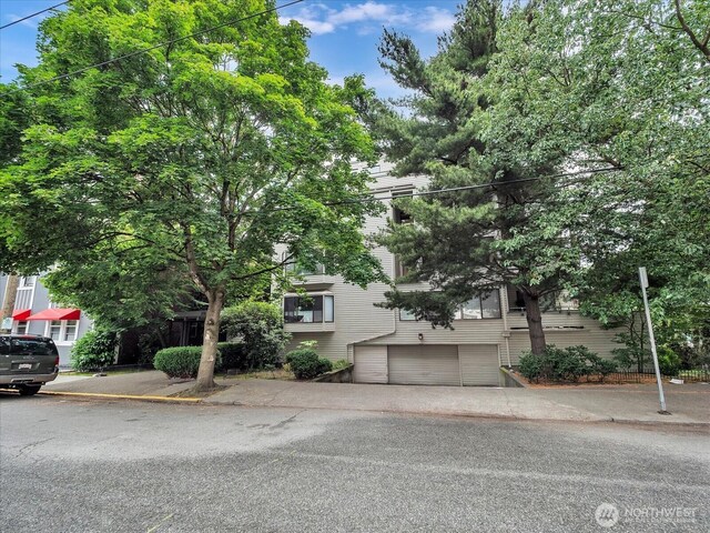 211 Summit Ave E Unit N308, Seattle, WA 98102 - obstructed view of property with a garage