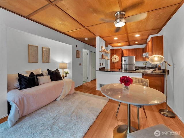 211 Summit Ave E Unit N308, Seattle, WA 98102 - dining area featuring light wood finished floors, a ceiling fan, recessed lighting, and wooden ceiling