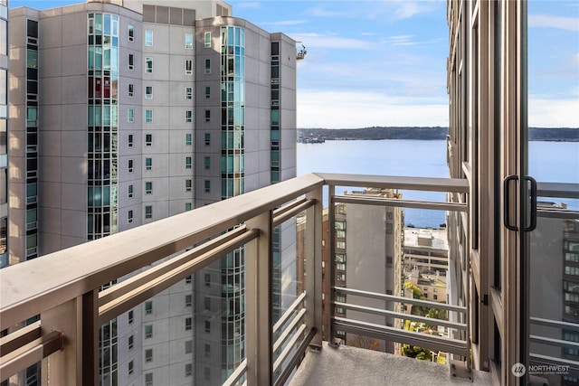 balcony featuring a water view