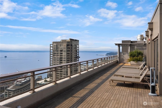 balcony featuring a water view