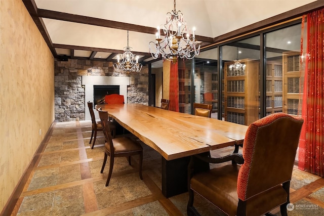 dining space with an inviting chandelier, a fireplace, and beam ceiling