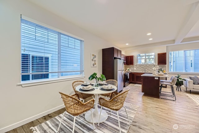 dining room featuring light hardwood / wood-style flooring