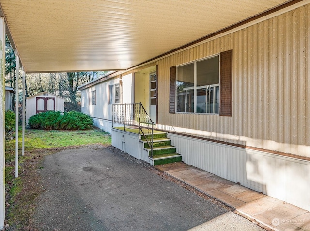 view of patio / terrace featuring a storage shed