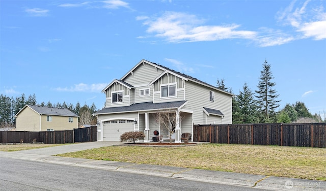 traditional home featuring board and batten siding, concrete driveway, fence, and a front lawn