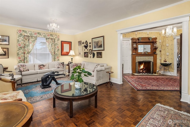 living room featuring ornamental molding, a notable chandelier, and dark parquet floors